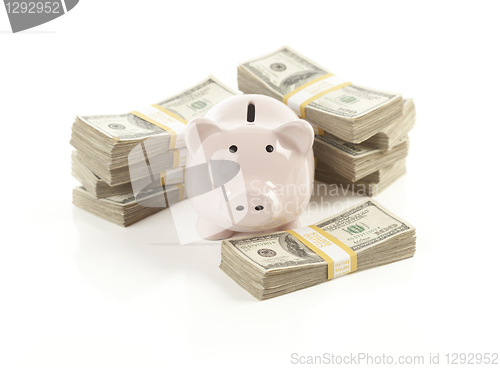 Image of Pink Piggy Bank with Stacks of Money