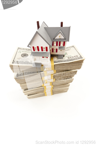 Image of Small House on Stacks of Hundred Dollar Bills