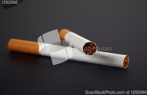 Image of two cigarettes