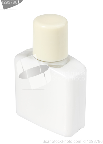 Image of White cosmetic cream in transparent bottle