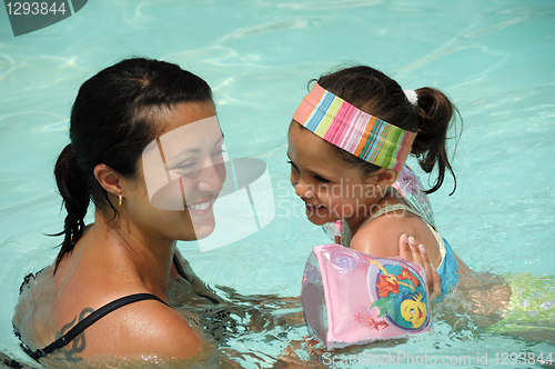 Image of Smiling woman and child