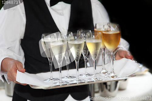 Image of Waiters served champagne and wine 