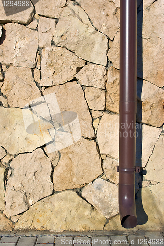 Image of Brick Wall And Pipe