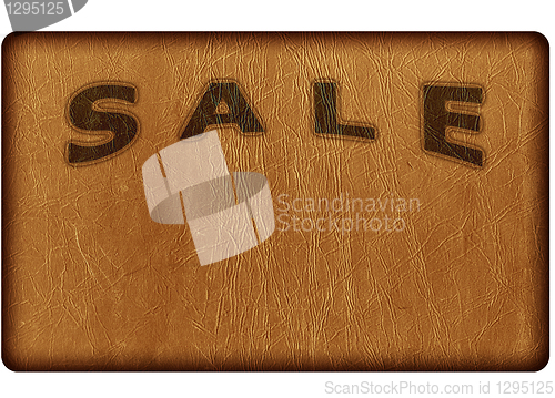Image of sale on the skin worn background