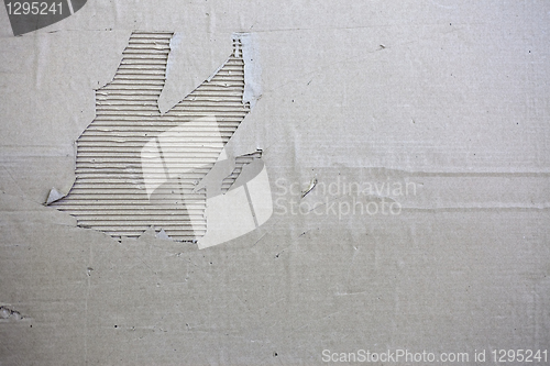 Image of The old torn cardboard banner, in monochrome