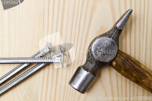 Image of Old hammer and nails 