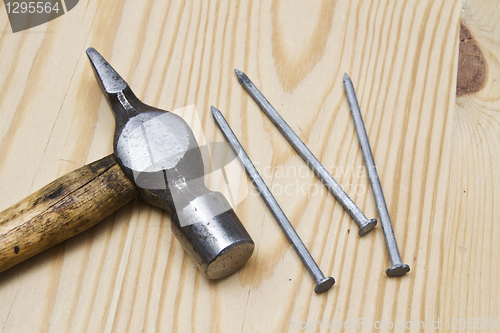 Image of Old hammer and nails 