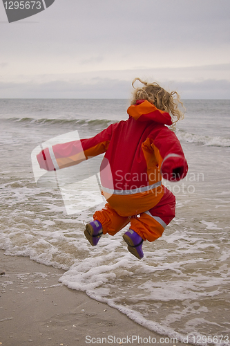 Image of jumping at the shore