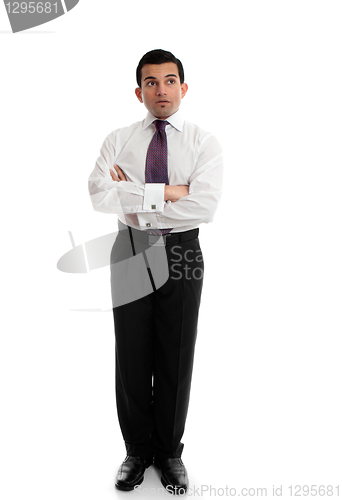 Image of Businessman thinking looking up