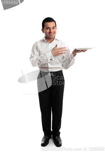 Image of Waiter or servant holding a white plate