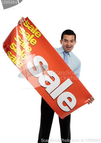 Image of Business or salesman holding Sale Banner