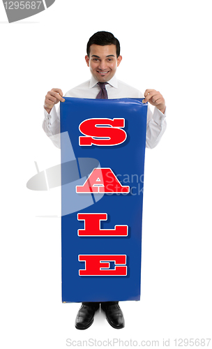 Image of Man holding a SALE sign