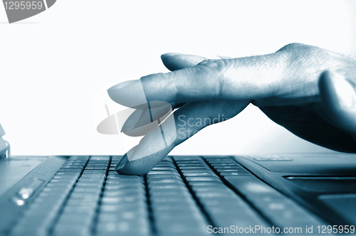 Image of typing hands on keyboard