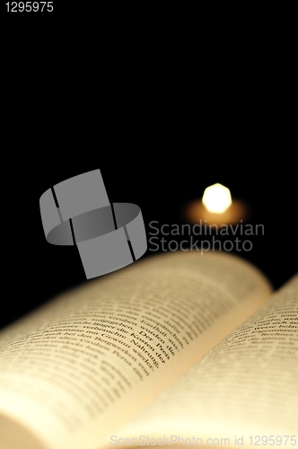 Image of book and candle