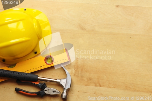 Image of hard hat and tool