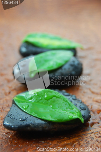 Image of zen concept with stones and leaves