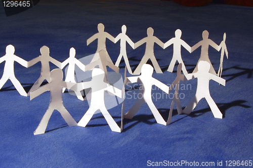 Image of paper people having a party