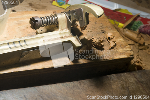 Image of hand made cigar trimming machine