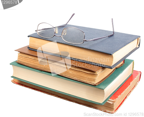 Image of Glasses and group of old dirty books