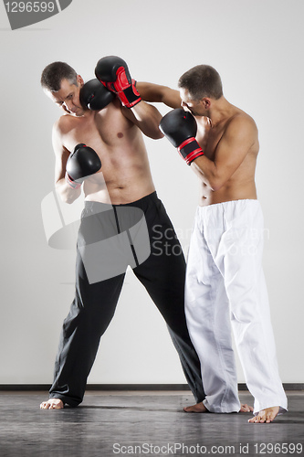 Image of two men fighting