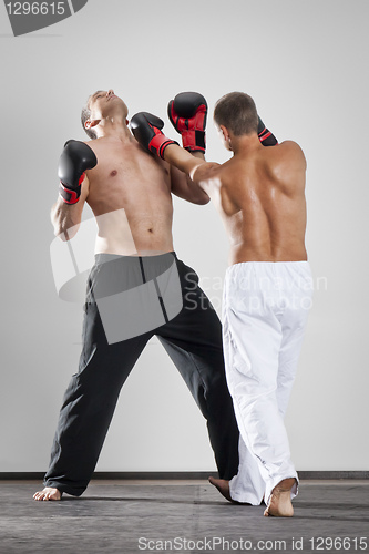 Image of two men fighting