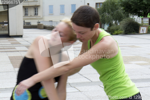 Image of Duet of dancers with blur motion