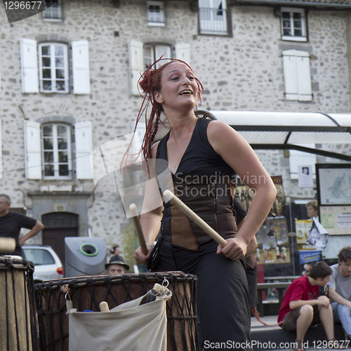 Image of Woman plays drums