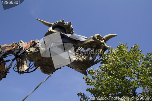 Image of Dragon eating some leaves