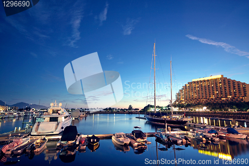 Image of large yachts in the golden coast at night 