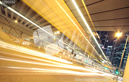 Image of busy traffic night in finance urban