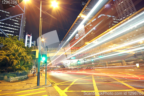 Image of busy traffic night in finance urban