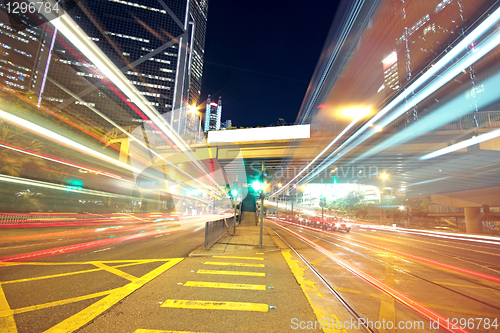 Image of busy traffic night in finance urban