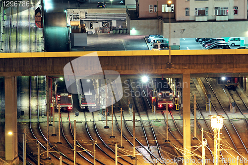 Image of Train tracks in hongkong by night.