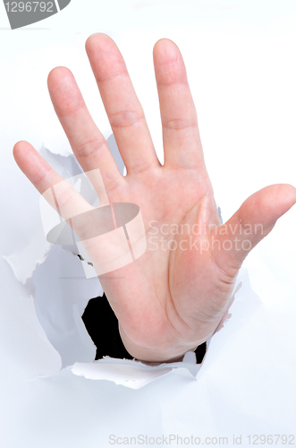 Image of hand broken the paper making sign