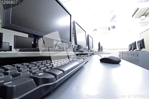 Image of workplace room with computers