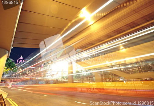 Image of busy traffic night in finance urban
