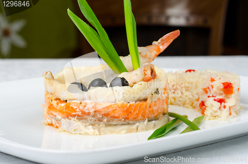 Image of fish with rice and vegetables