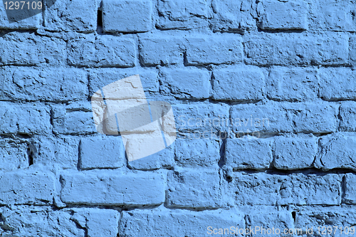 Image of the blue painted brick wall