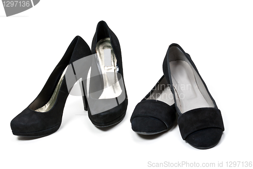 Image of two pairs of female black suede shoes