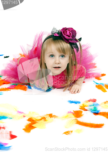Image of little girl lies