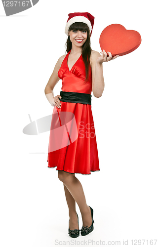 Image of girl in a red dress, hat santa