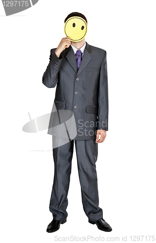 Image of Businessman covers his face with a yellow round cardboard circle