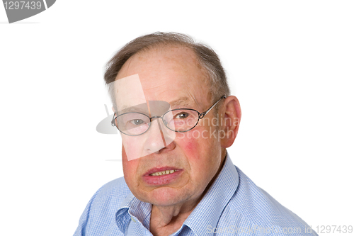 Image of Male senior snarling