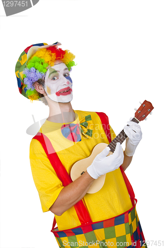 Image of Colorful clown with ukulele