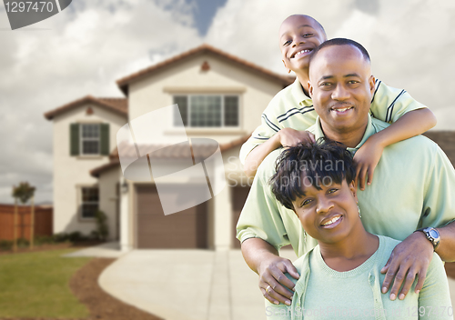 Image of Attractive African American Family in Front of Home