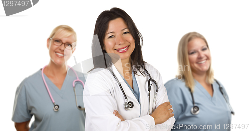 Image of Hispanic Female Doctor and Colleagues Behind