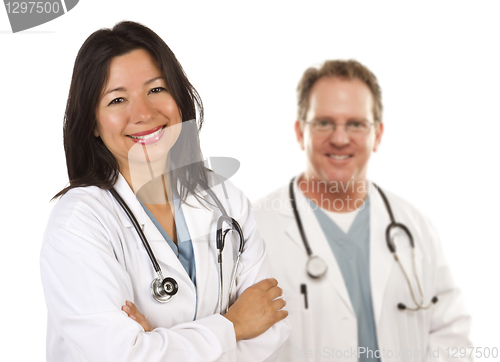 Image of Hispanic Female Doctor and Male Colleague Behind