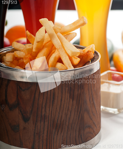 Image of fresh french fries on a bucket