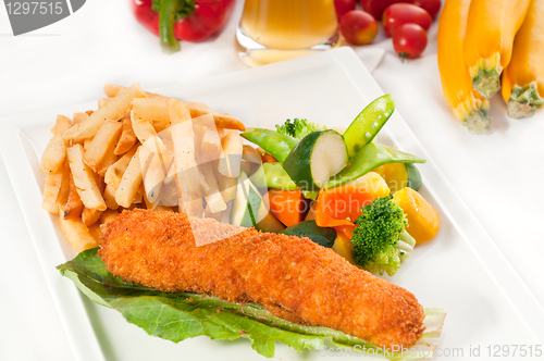 Image of fresh chicken breast roll and vegetables
