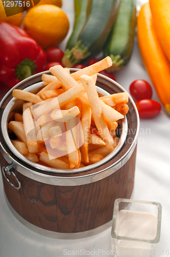 Image of fresh french fries on a bucket